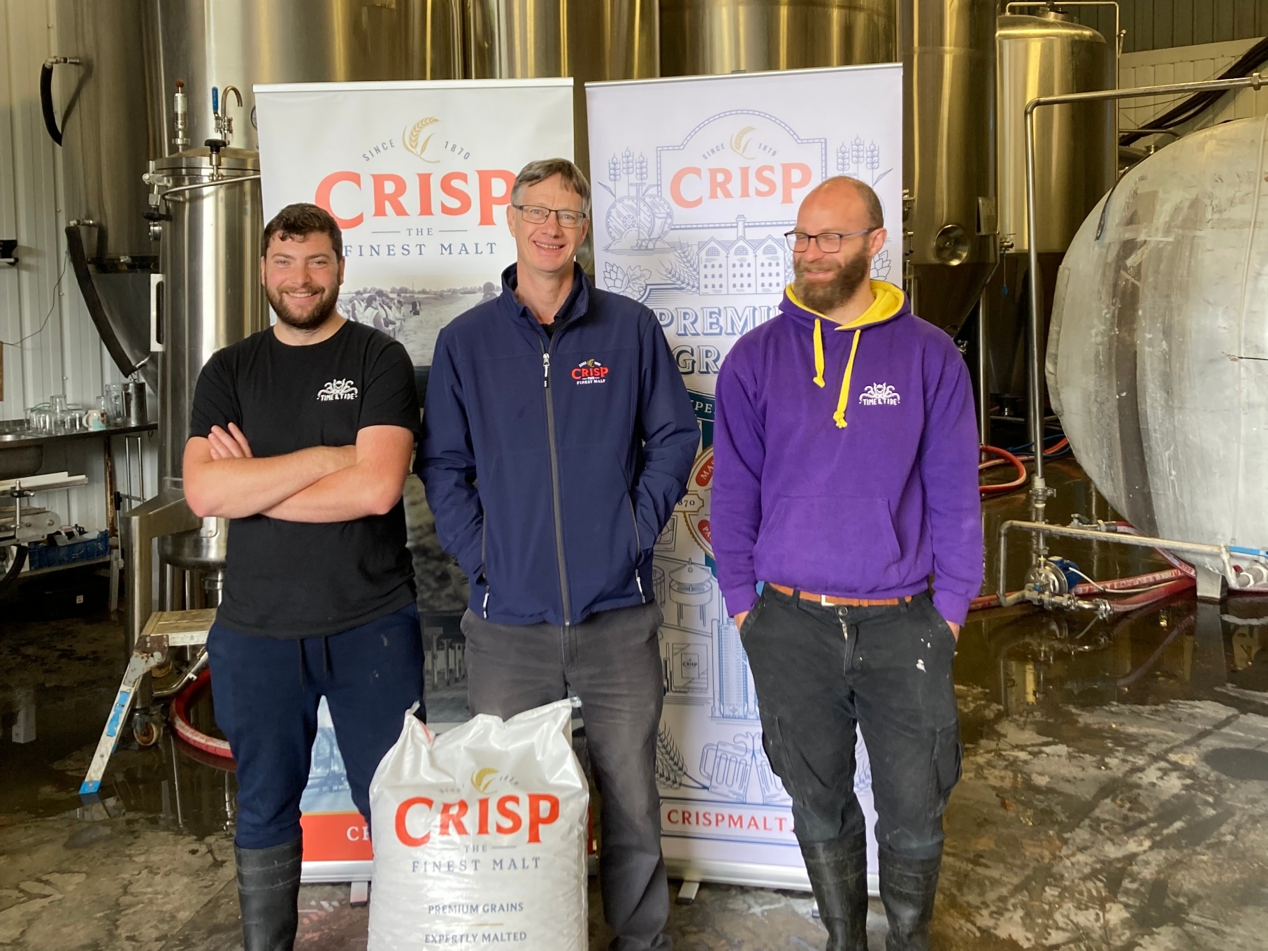 Nigel from Crisp Malt standing with the Time and Tide Brewery team on brew day.